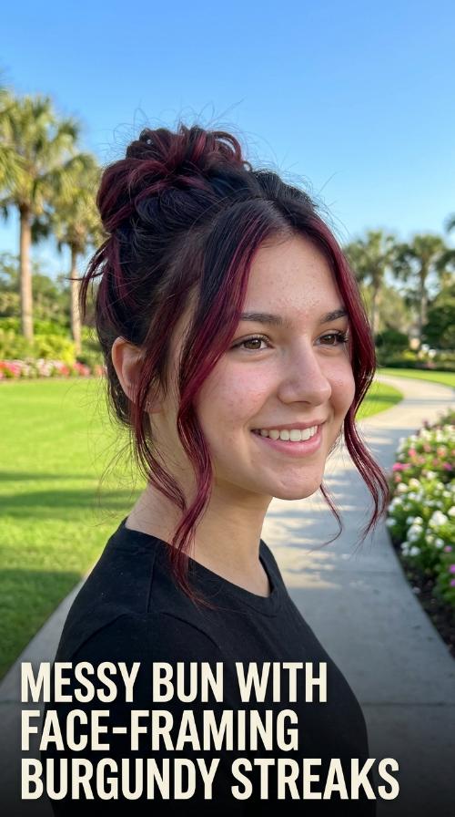 Messy Bun with Face-Framing Burgundy Streaks